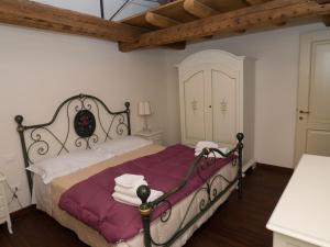 Ліжко або ліжка в номері Agriturismo Villa Anconetta