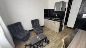 Kuchyň nebo kuchyňský kout v ubytování Apartamentos FM Loft 303