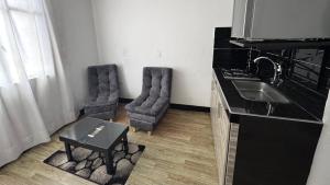 Köök või kööginurk majutusasutuses Apartamentos FM Loft 303