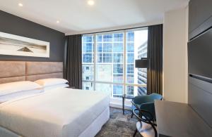 Posteľ alebo postele v izbe v ubytovaní Four Points by Sheraton Auckland