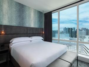 Posteľ alebo postele v izbe v ubytovaní Four Points by Sheraton Auckland