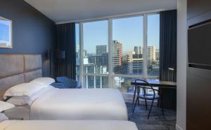 Posteľ alebo postele v izbe v ubytovaní Four Points by Sheraton Auckland