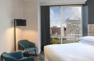 Posteľ alebo postele v izbe v ubytovaní Four Points by Sheraton Auckland