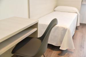 Postel nebo postele na pokoji v ubytování Hotel Julimar