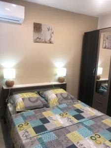 Ένα ή περισσότερα κρεβάτια σε δωμάτιο στο Paisible et confortable pour vous