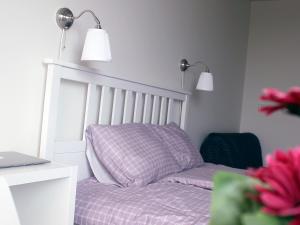 Postel nebo postele na pokoji v ubytování Fenix Inn