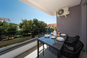 Μπαλκόνι ή βεράντα στο Lumare - Beautiful Family Apartment +19 φωτογραφίες
