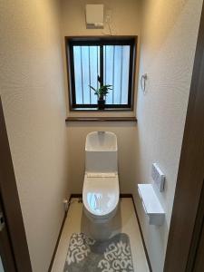 Baðherbergi á 一休草加1階貸切
