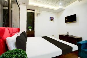 TV a/nebo společenská místnost v ubytování Hotel O Kashish Residency