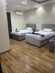 Postel nebo postele na pokoji v ubytování Guest rest view INN