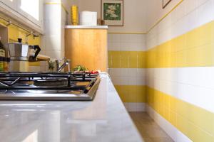 A kitchen or kitchenette at Santonofrio SKY Terrace Penthouse