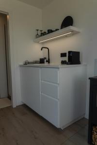 Kuchyň nebo kuchyňský kout v ubytování Glamping Soleda