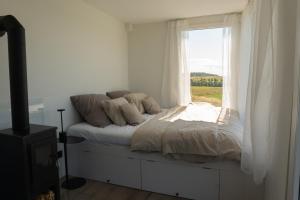 Postel nebo postele na pokoji v ubytování Glamping Soleda