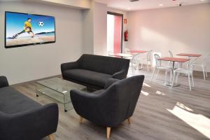 TV a/nebo společenská místnost v ubytování Hotel Julimar
