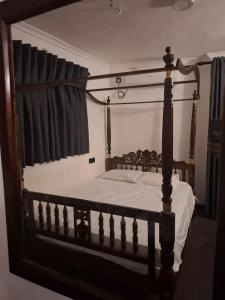 Postel nebo postele na pokoji v ubytování Enderamulla Casual Home