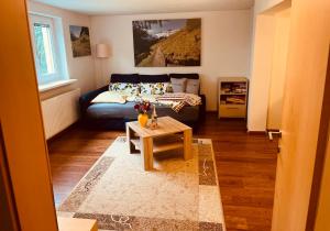Postel nebo postele na pokoji v ubytování Ferienwohnung Glusavinahüsle