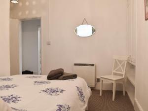 Ένα ή περισσότερα κρεβάτια σε δωμάτιο στο Flat 2 Beachview - Ukc4220