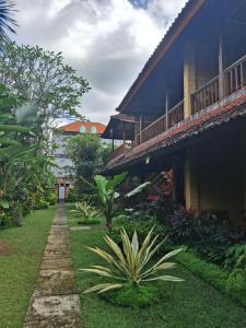 En have udenfor Rice paddy bungalow + 19 billeder