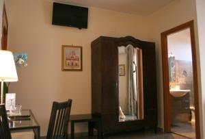 A television and/or entertainment centre at B&B Melibleo