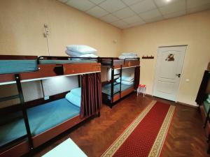 Postel nebo postele na pokoji v ubytování Kefir & Bun Hostel