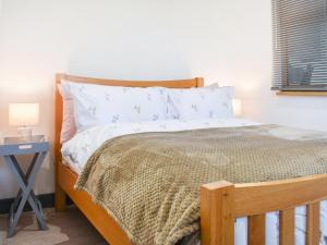 Ένα ή περισσότερα κρεβάτια σε δωμάτιο στο Spring Lodge +12 φωτογραφίες