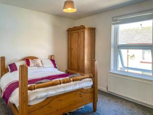 En eller flere senge i et værelse på Gwens House + 4 billeder