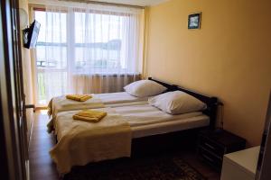 Posteľ alebo postele v izbe v ubytovaní Hotel Gołuń