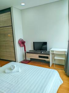 Et tv og/eller underholdning på Sky Suites KLCC Suites Apartment