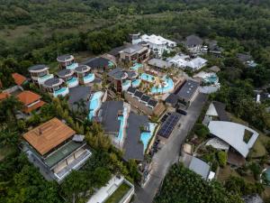 an aerial view of a house with a swimming pool at Seascape Resort & Spa Uluwatu by Ini Vie Hospitality in Uluwatu