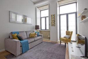 A seating area at OHH -Porto 4 you- Deluxe Apartment With Free Parking