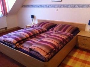 Postel nebo postele na pokoji v ubytování Hotel Eigelstein