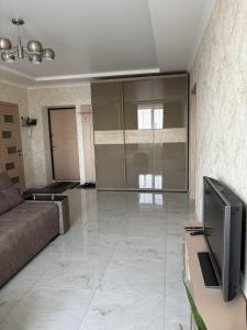 TV a/nebo společenská místnost v ubytování Apartment in the CENTER of Lutsk Elit