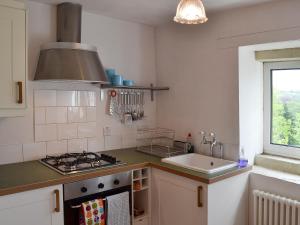 Kuchyň nebo kuchyňský kout v ubytování Pear Tree House Annexe