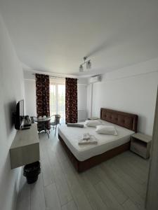 Postel nebo postele na pokoji v ubytování Luxury by SARAY