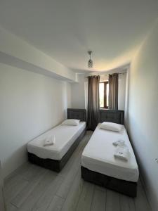 Postel nebo postele na pokoji v ubytování Luxury by SARAY