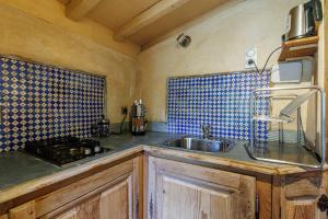 Kuchyň nebo kuchyňský kout v ubytování Le Cabanon d'Yreye + 15 fotografií