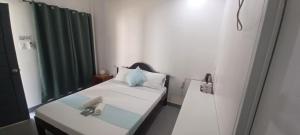 Postel nebo postele na pokoji v ubytování Sebastian Guest House