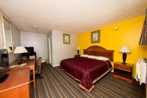 Postel nebo postele na pokoji v ubytování Scottish Inn and Suites - Bensalem-Philadelphia