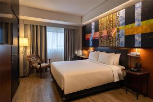 Voodi või voodid majutusasutuse Hilton Garden Inn Asuncion Aviadores Del Chaco toas