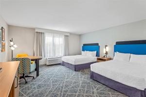 Postel nebo postele na pokoji v ubytování Hampton Inn Cooperstown