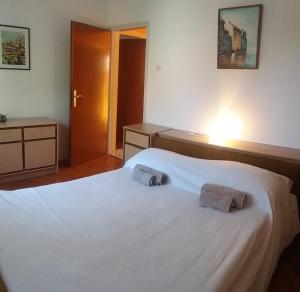 Postel nebo postele na pokoji v ubytování Ana & Marko-Island Ošljak