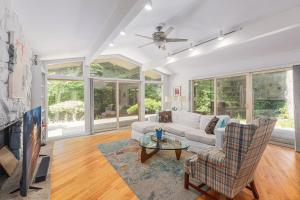 a living room with a couch and a table at Bright 4BDR Home by Lake MI Arcadia Bluffs Portage Lake More in Arcadia