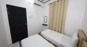 Φωτογραφία από το άλμπουμ του OYO 90976 Pantaistay@baturakit σε Batu Rakit