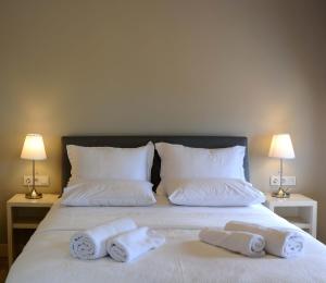 Säng eller sängar i ett rum på Teos Lodge
