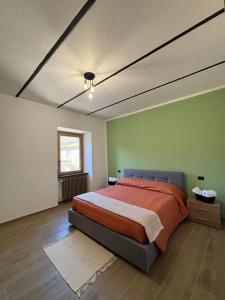 Postel nebo postele na pokoji v ubytování Cascina Barbei