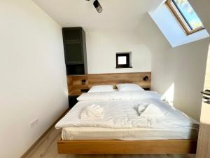 Postel nebo postele na pokoji v ubytování Csipetnyi Chill Vendégház