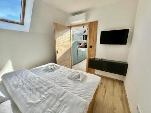 Postel nebo postele na pokoji v ubytování Csipetnyi Chill Vendégház