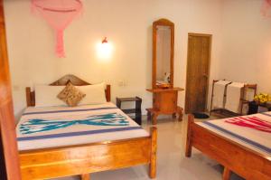 Postel nebo postele na pokoji v ubytování Horizon Resort & Hostel Sigiriya