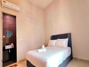 Ένα ή περισσότερα κρεβάτια σε δωμάτιο στο 3 bedrooms condor nearest Jonker Walk at Ong Kim Wee Residence +24 φωτογραφίες