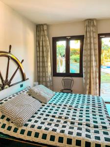 Katil atau katil-katil dalam bilik di Casa Lago